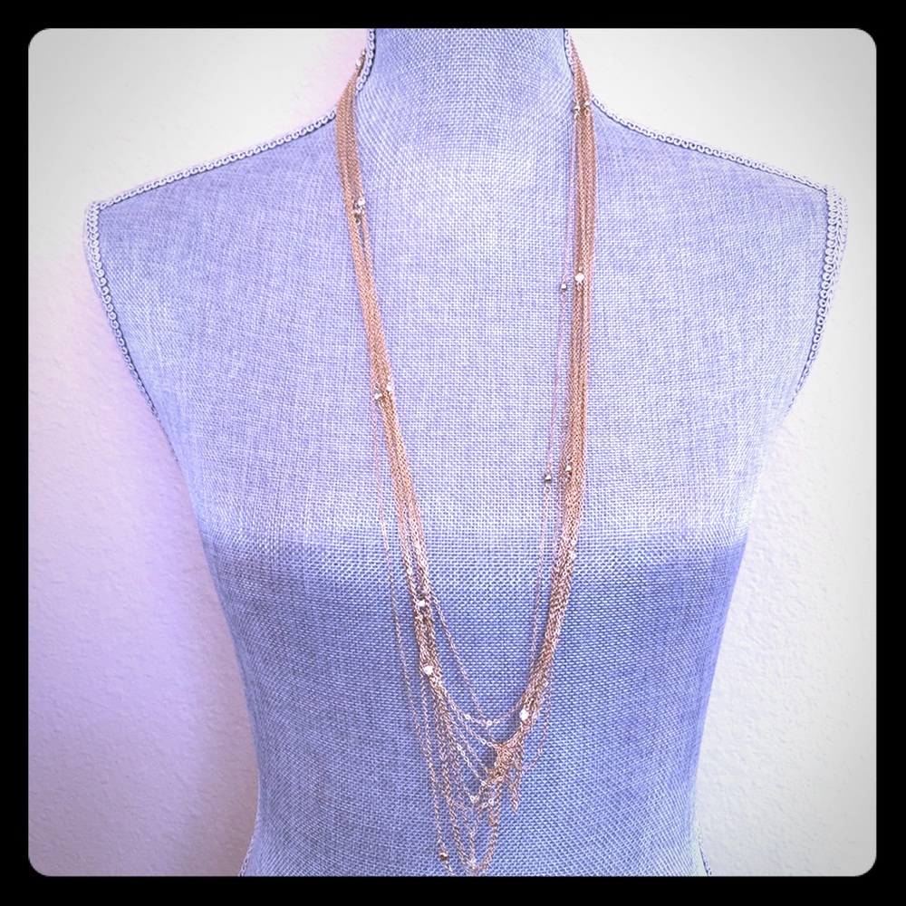 Lovely gold tone necklace with little rhinestones